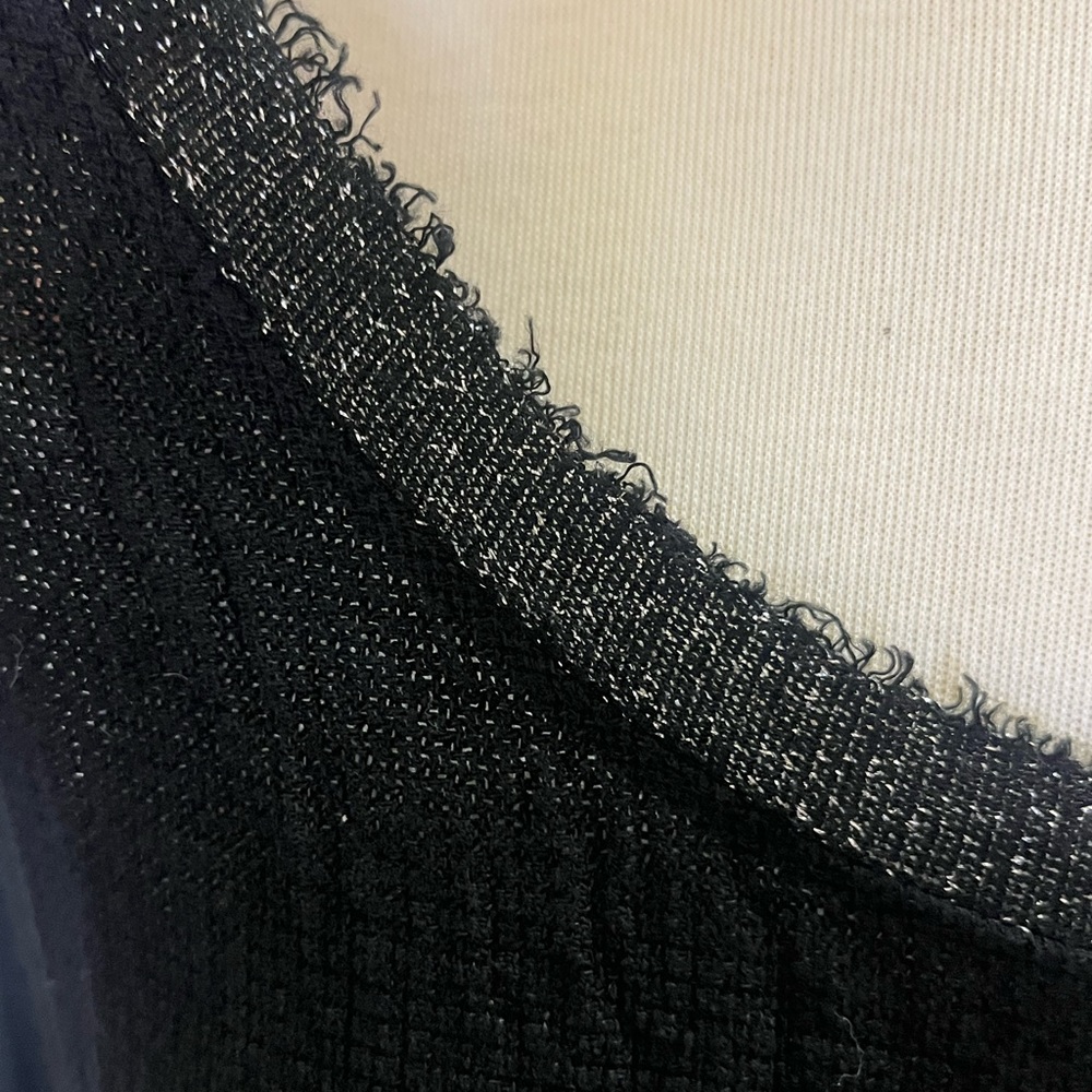Black sleeveless top with silver lurex trim around the neck - Picture 7 of 9